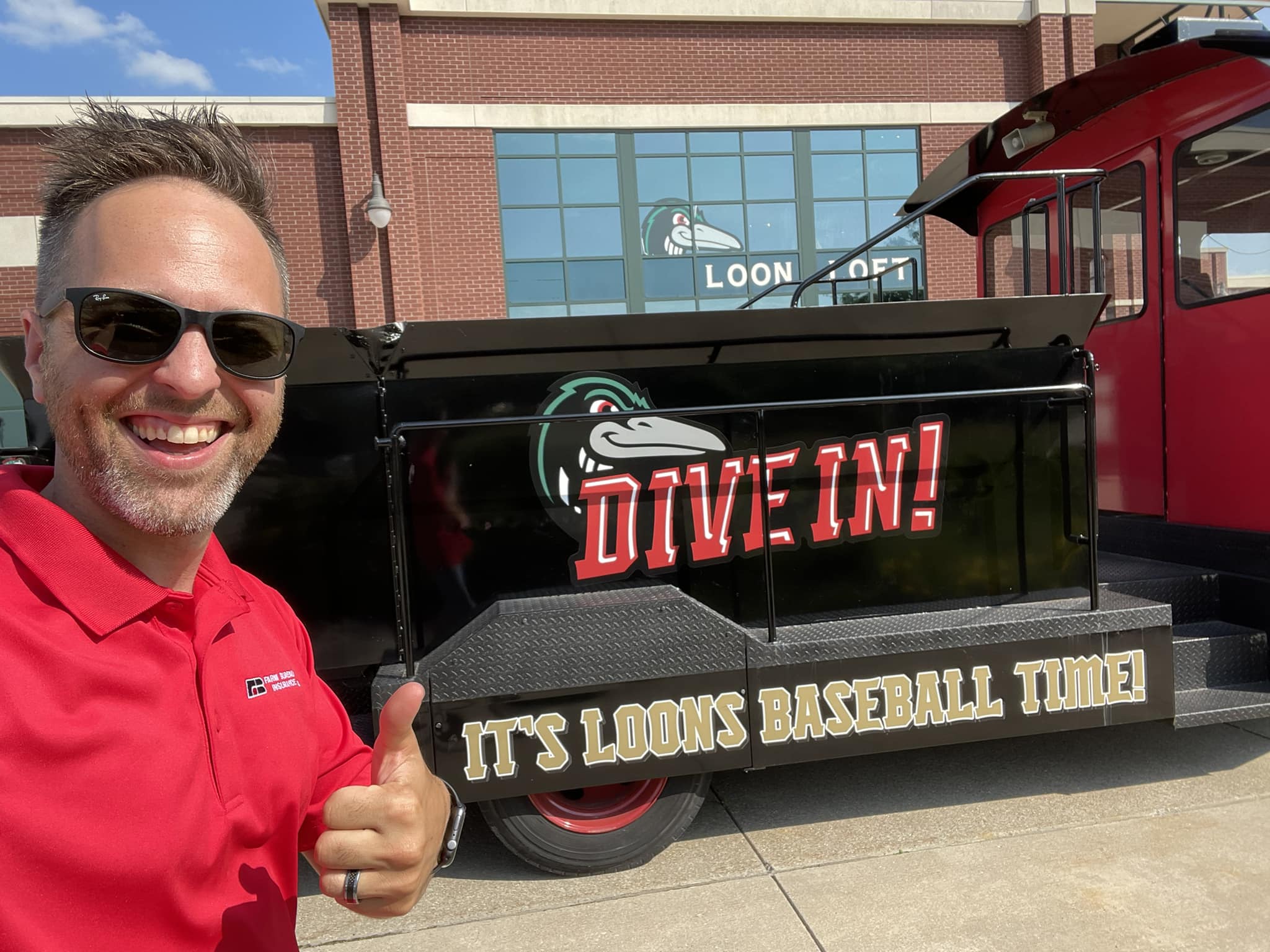 Man next to Loons Baseball Promo Truck